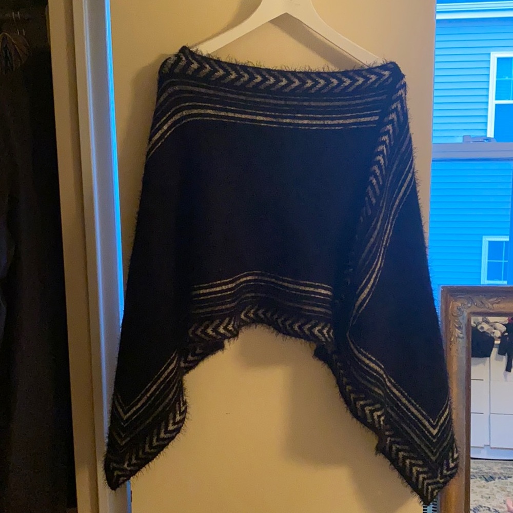 Softest and fuzziest poncho! Never worn.
